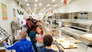 The school lunch program provides 3 million meals to military children overseas including these students at Netzaberg Elementary School, Germany.