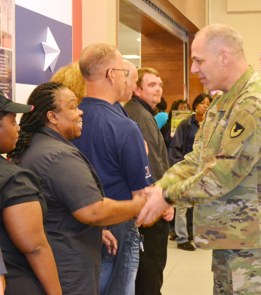 General_web GEN Perna shook the hand of each associate recognized, including Rita King.