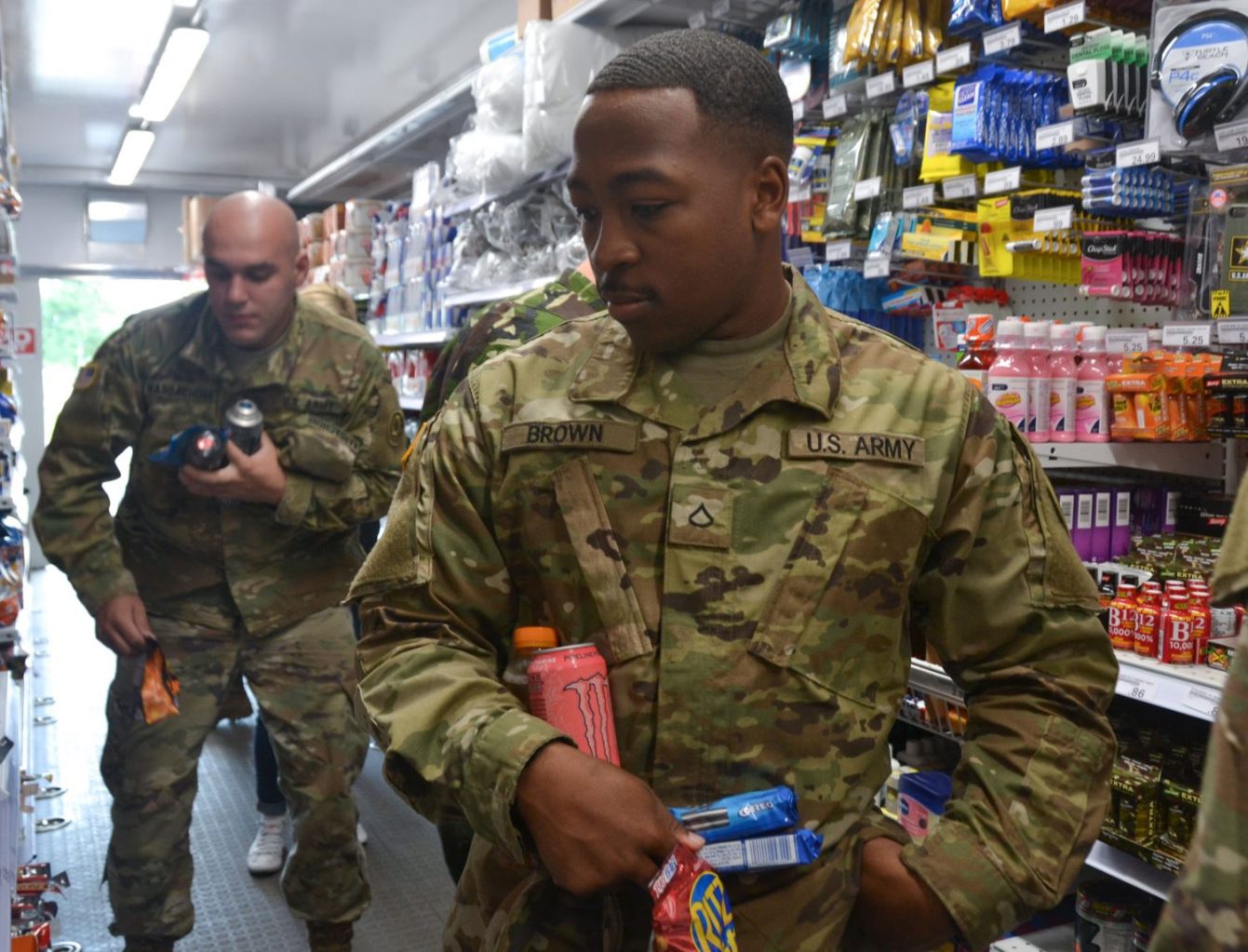Poland1 Troops grabbing snacks in the MFE.