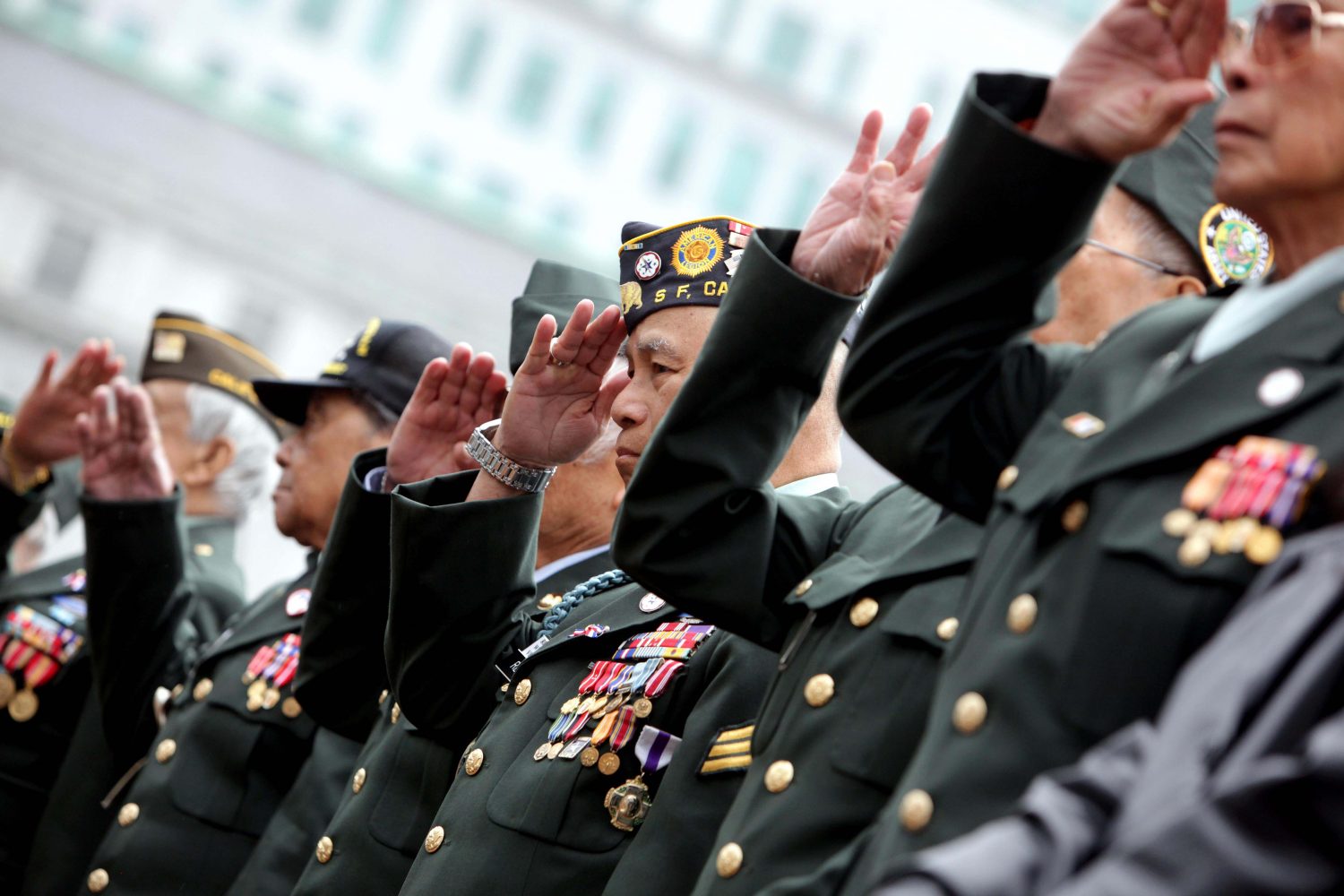 Veterans Day Members of the Veterans Affairs Commission for the City and County of San Francisco salute participants in the annual Veterans day parade in San Francisco, Calif., on Friday, November 11, 2011.