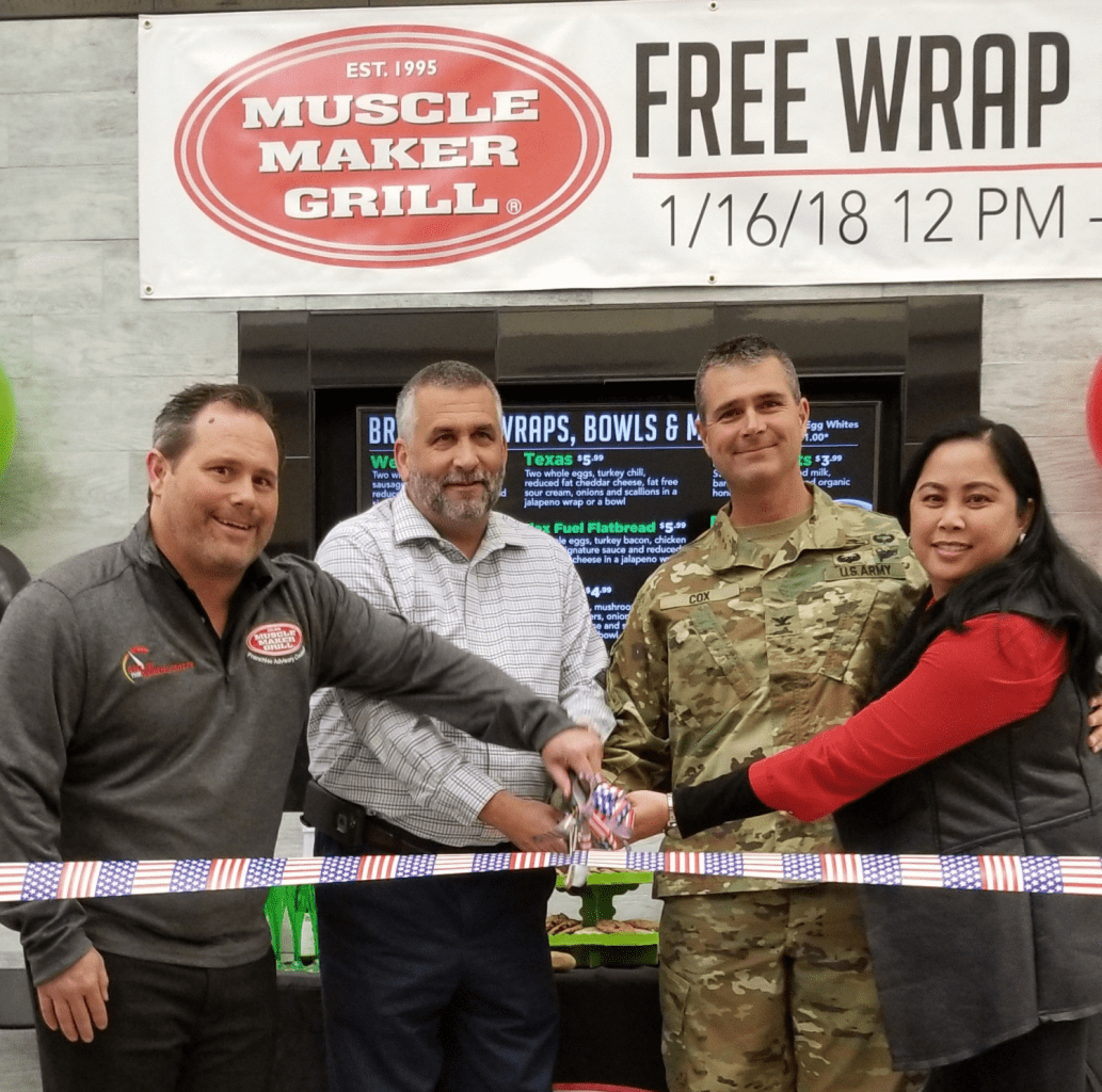 MuscleMaker grill Ribbon-cutting ceremony: Left to right: Mark Farmer, Muscle Maker Grill vice president of operations; Don Sydlik, Exchange general manager; Col. Clinton Cox, Fort Benning garrison commander; and Rutchel Williams, Exchange services business manager.
