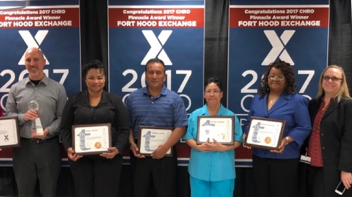 Left to right, r. Patrick Oldenburgh, Jr.,  Vice President, HR Operations;
Joel Zepeda HR Manager;
Dora Reyes, Dino Castro, 
Beverly Moore, all HR administrators; 
Arna Yarbrough, Director, CONUS Operations;
Leigh Roop Executive Vice President and Chief HR Officer