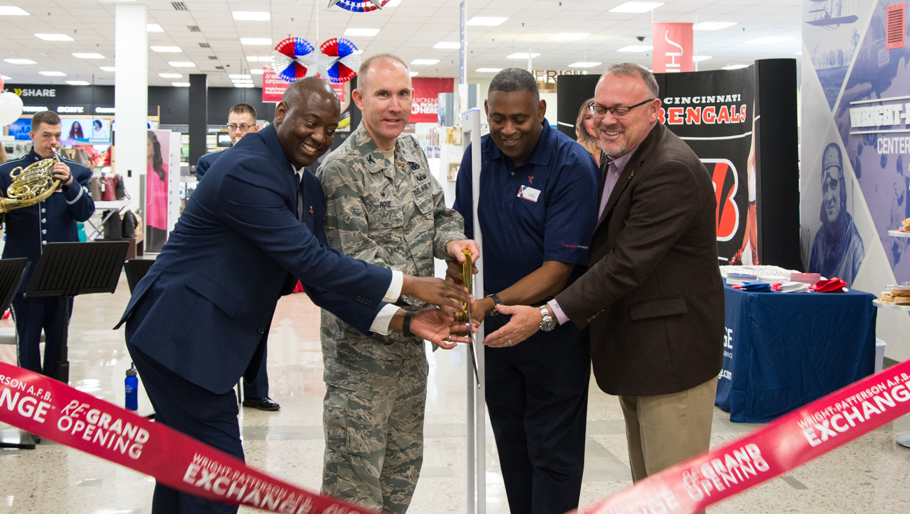 181025-F-JV466-1033 Col. Leonard Rose, commander, 88th Mission Support Group joins General Manager Jermaine Wilson, Store Manager Donald Basil and Central Region Vice President Ronny Rexrode grand opening ceremonies of the renovated Exchange.