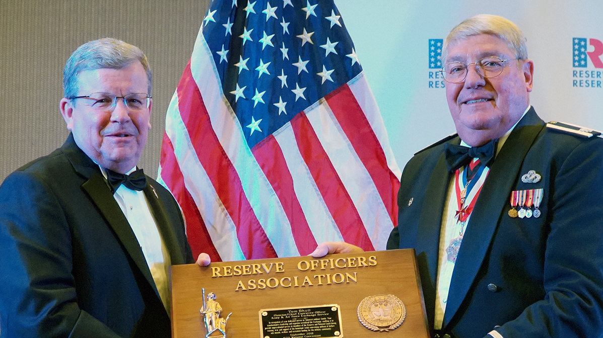 CEO-ROA-award Exchange Director/CEO Tom Shull, left, became the 98th member inducted into the Reserve Officers Association Minuteman Hall of Fame on Sept. 29 at ROA’s national convention in Omaha. Mr. Shull accepted the award from ROA President Donald Stockton, a retired Air Force Reserve lieutenant colonel, on behalf of the worldwide Exchange team's collective efforts to care for America’s citizen-warriors, their families, retirees and Veterans.