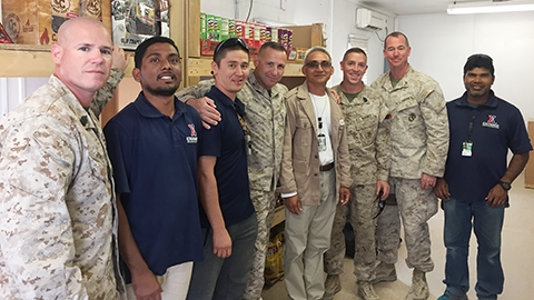 MiddleEastSTORE COL John Armellino, commander of the 8th Marine Regiment, center, and his leaders pose with associate Naresh Sethi, and Azamat Narynekov, Exchange Afghanistan GM Robin Chetri, and associate Mustak Ahamed.