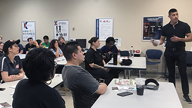 RoySill Roy Montez, the Exchange's BE FIT ambassador, talks to a class of food service workers at Fort Sill, Okla., about how to make better-for-you options.