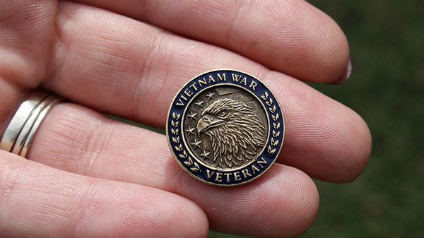 VietnamPin Vietnam Veteran lapel pin in hand.