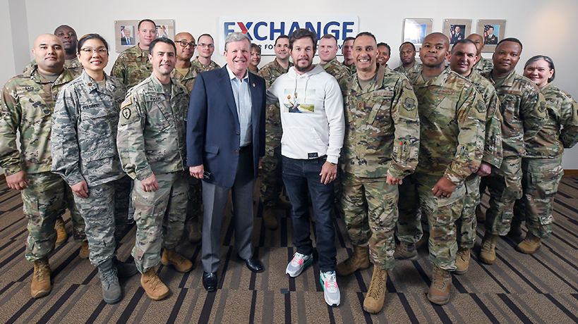 Mark Wahlberg Tom Shull Chief Reyes and AAFES military Actor Mark Wahlberg stands with Exchange Director/CEO Tom Shull and Soldiers and Airmen assigned to HQ.