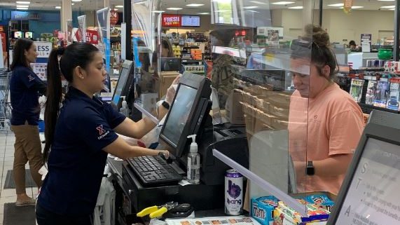 Sneeze_guard Plastic shields, like these at the Fort Hood Exchange, help protect associates and customers during the COVID-19 pandemic.
