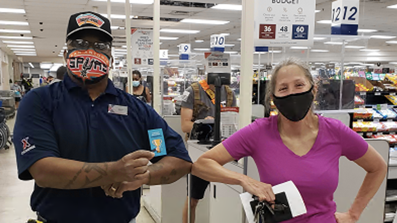Screen Shot 2020-05-11 at 1.27.48 PM Winford Smith, loss prevention associate at JB San Antonio-Fort Sam Houston, helps a customer at the main store.