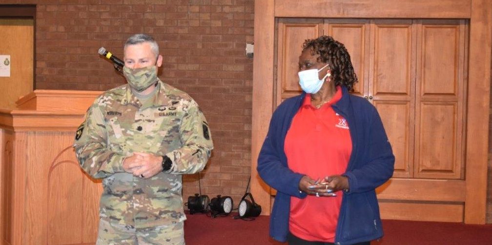 Rosa Bell 7 Rosa Bell with LTC Cory Roberts, commander of the 1st Battalion, 19th Regiment at Fort Benning, which held a retirement presentation for Bell on May 17. Her Exchange retirement ceremony is scheduled for May 27