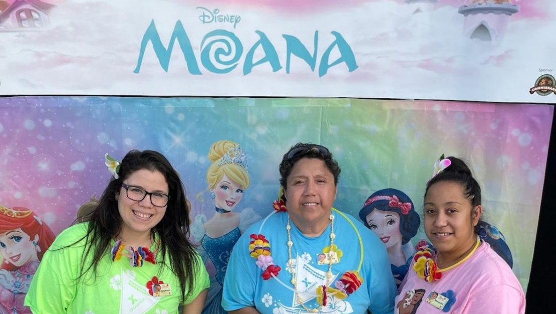 Fort Leavenworth Moana 5 From left to right: Stephanie Rivera (Customer Experience teller), Marina Lemanua (assistant store manager) and Marquita Herrera (visual merchandiser) get in the spirit at Fort Leavenworth's screening of Disney's "Moana."