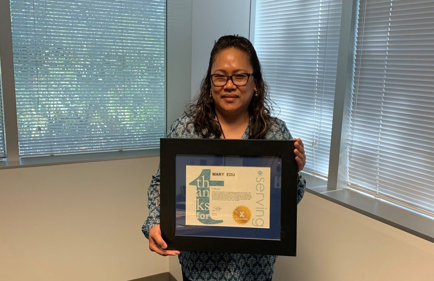 Family Serving Family_Mary Edu Serving Award Mary Edu has spent her entire 20-year Exchange career at the West Coast Distribution Center, where she works with five members of her family.