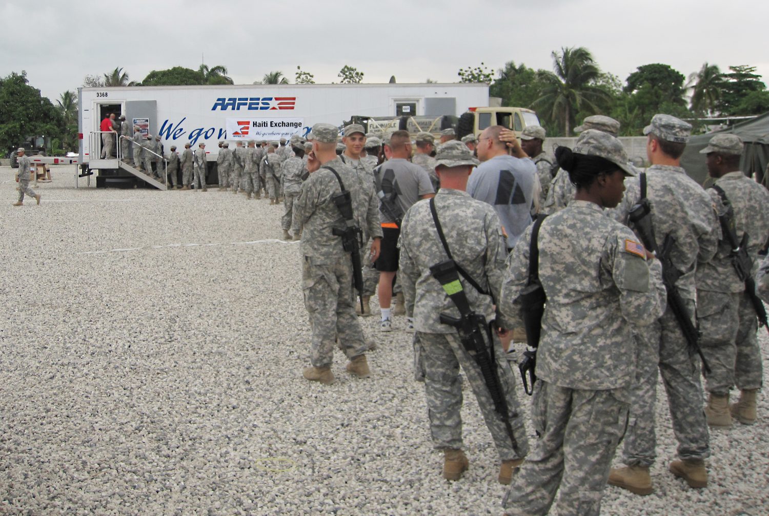 Haiti MFE Soldiers supporting recovery efforts in Haiti after the 2010 earthquake line up at a mobile field exchange.