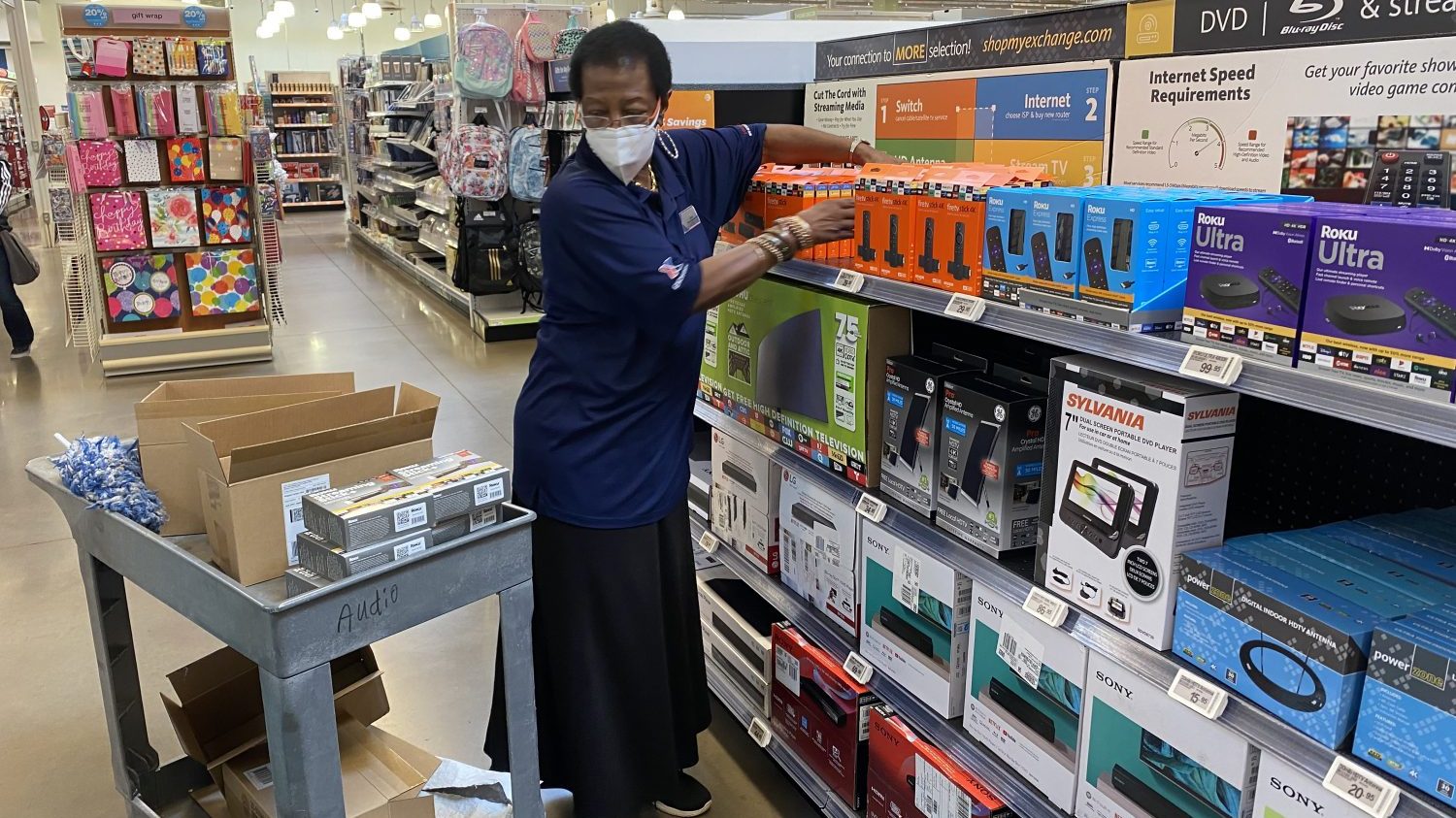 FSF_Rozsele Catanch <strong>Rozsele Catanch, known as "Ms. Sue," stocks shelves at the Shaw Air Force Base Exchange. She is known for her intercom announcements and for promoting store events on Facebook Live, where she might even sing a song.</strong>