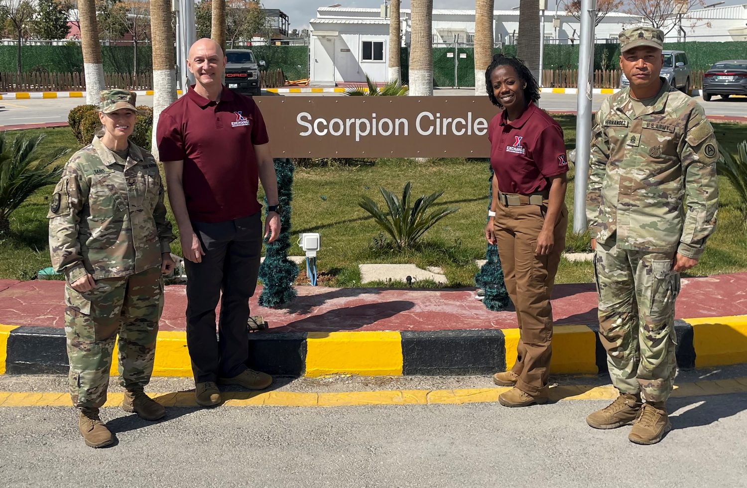 SWA 003 Exchange Europe/Southwest Asia Region Commander Col. Don Nowlin (second from left) and Exchange Europe/Southwest Asia Region Senior Enlisted Advisor Sgt. Maj. Lemakius Gardner (second from right) stand with Area Support Group-Jordan Commander Col. Toni Sabo (left) and Area Support Group-Jordan Command Sgt. Maj. Jose Hernandez (right) during their visit to the SWA region March 3-11