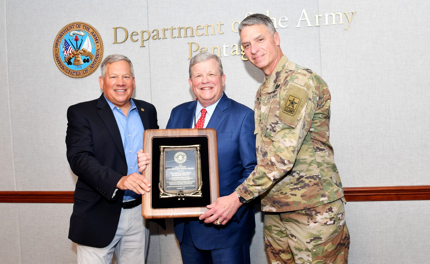 AER Award From left, Army Emergency Relief director retired Lt. Gen. Raymond Mason, Exchange Director/CEO Tom Shull, and Vice Chief of Staff of the U.S. Army Gen. Joseph Martin with the AER's 2022 Jack Ritchie Distinguished Service Award. The award was presented to the Exchange for its work in championing the AER mission of providing financial assistance to Soldiers and their families.