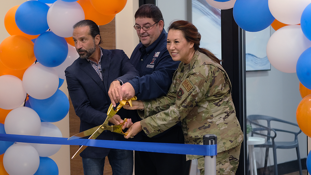 Travis_Docs Ribbon Cutting <b>Larry Caplin (Docs Dental Founder), Center: Jeremy McLaughlin (Services Business Manager), Right: Colonel Elizabeth Aptekar (Commander 60th Mission Support Group).</b>