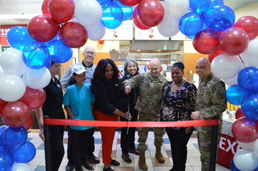 JBER_Rhea's Mini Donuts GO <b>from left to right: Exchange food court manager Amanda Quennell; Realyn & Jason Smith, restaurant owners; Exchange Services Business Manager Dahlia Haliburton: Exchange General Manager Keola Chan; 673 MSG CC Col. Erik Dunn; Exchange Services Ops Assistant Mazie Purdue, Chief Allen Quinata.</b>