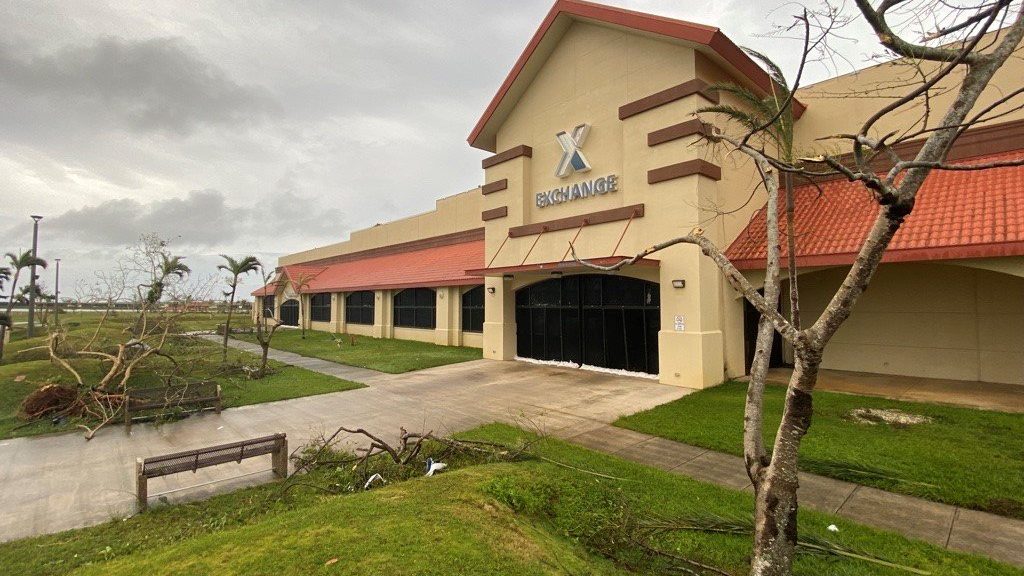 Typhoon Mawar_Downed trees <b>Typhoon Mawar knocked down outside the Guam Exchange and on most of the island.