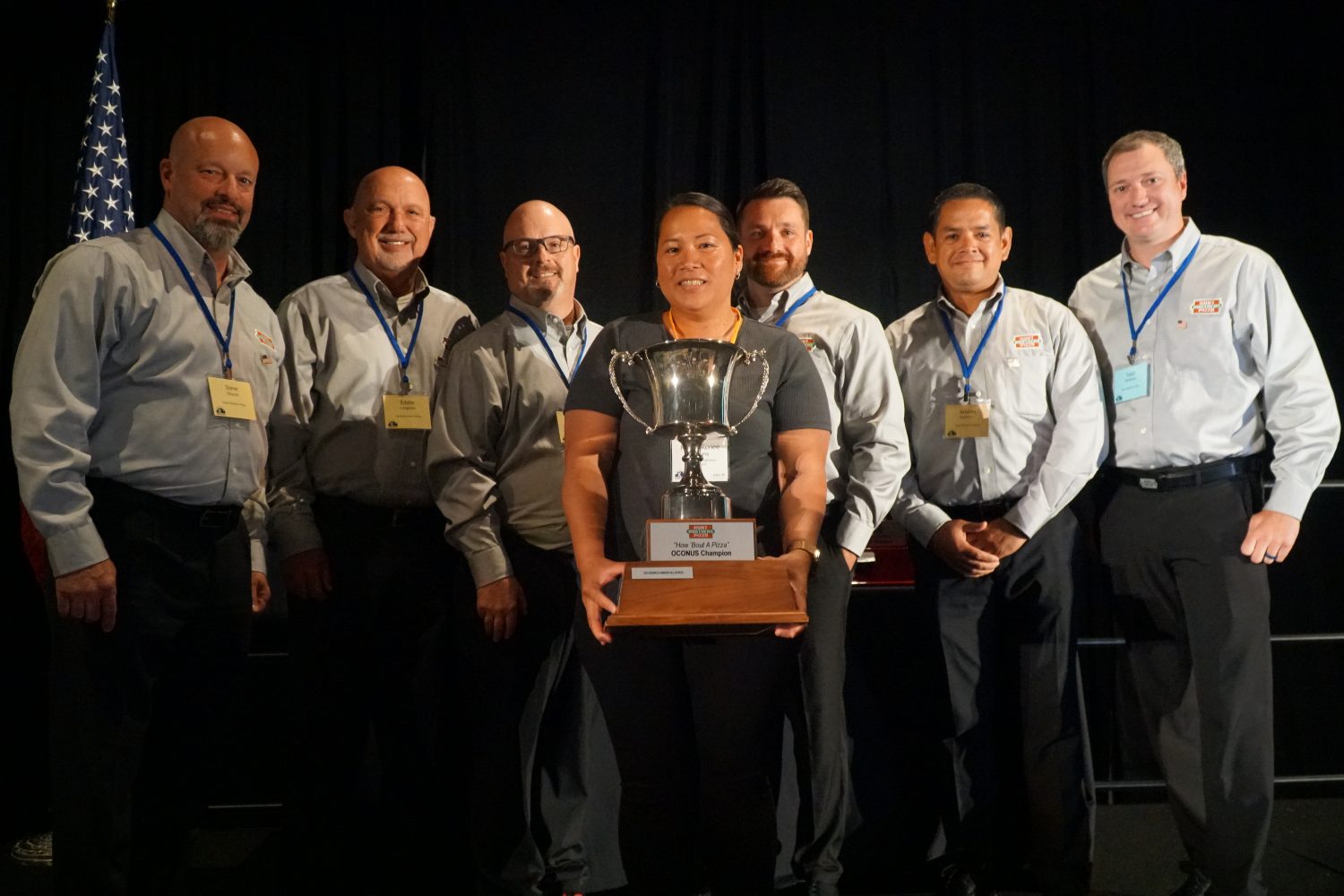 <b>Fort Carson Wilderness Express Manager Naomi Renee Apatang accepts the CONUS champion award presented by Hunt Brothers Pizza representatives at the 2023 Express Seminar.<.b>