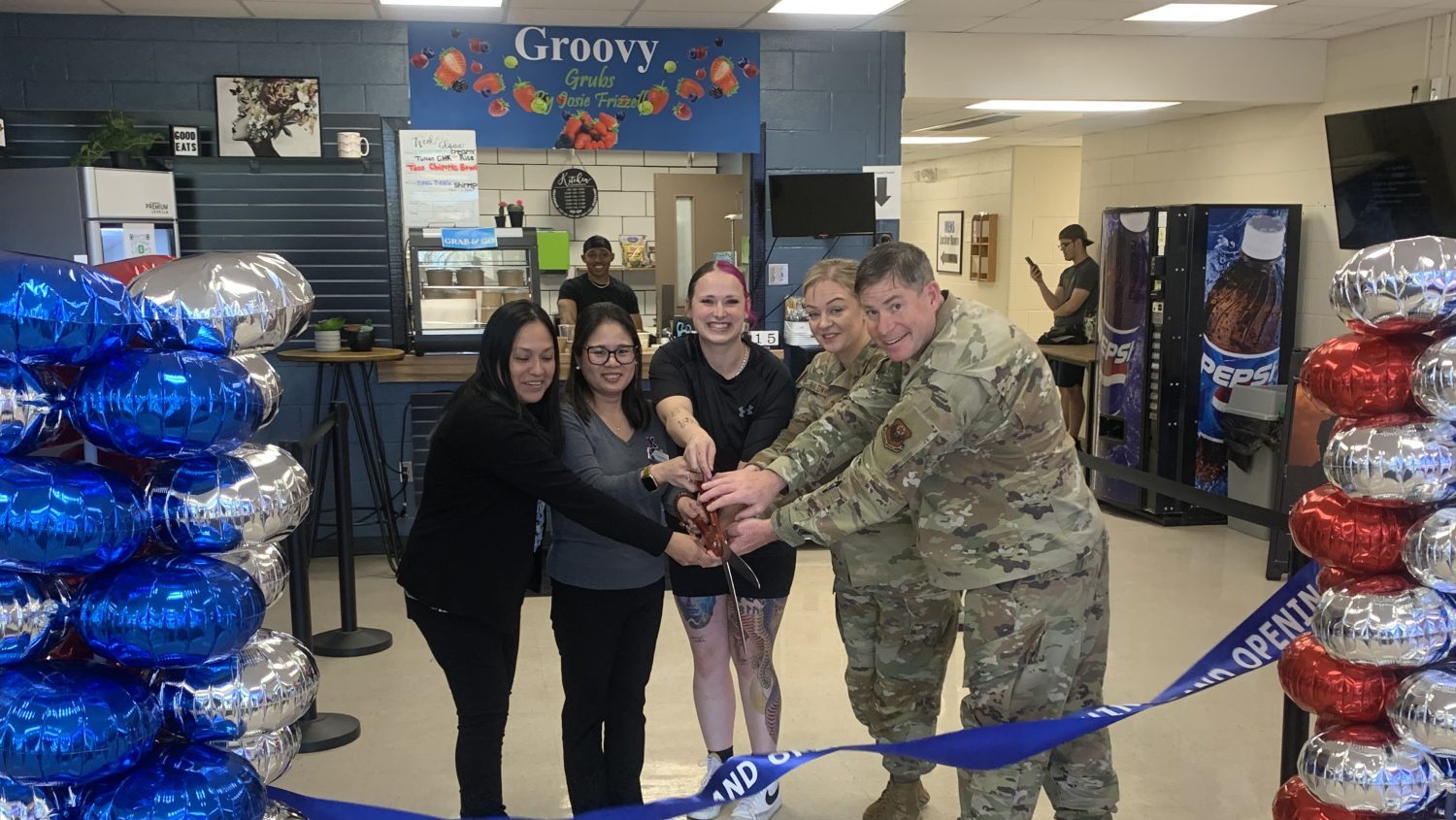 CannonAFB_GroovyGrubs <b>Maria Rivera, Exchange services business manager; Joanne Bedford, Exchange general manager; Josie Frizzell, owner; Jessica Baldwin, 27th Special Operations Wing chief; Col. Barry Roche, 27th Special Operations Wing commander.</b>