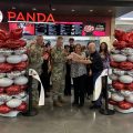 Exchange and installation leaders cut the ribbon on the new Panda Express at MacDill AFB.