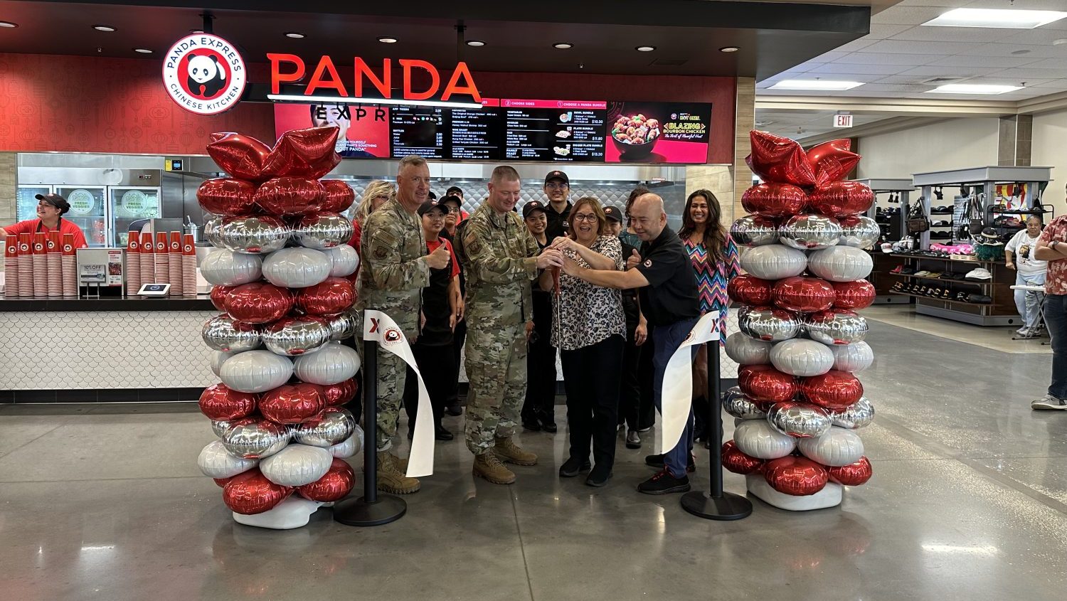 MacDill_Panda Express_Grand Opening Exchange and installation leaders cut the ribbon on the new Panda Express at MacDill AFB.
