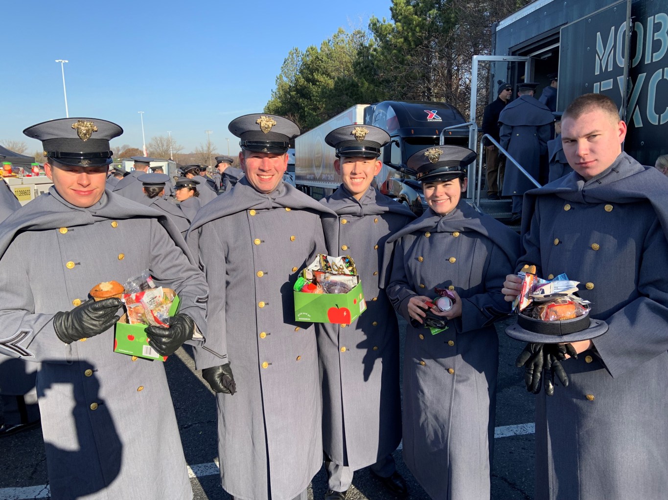 Cadets holding snacks
