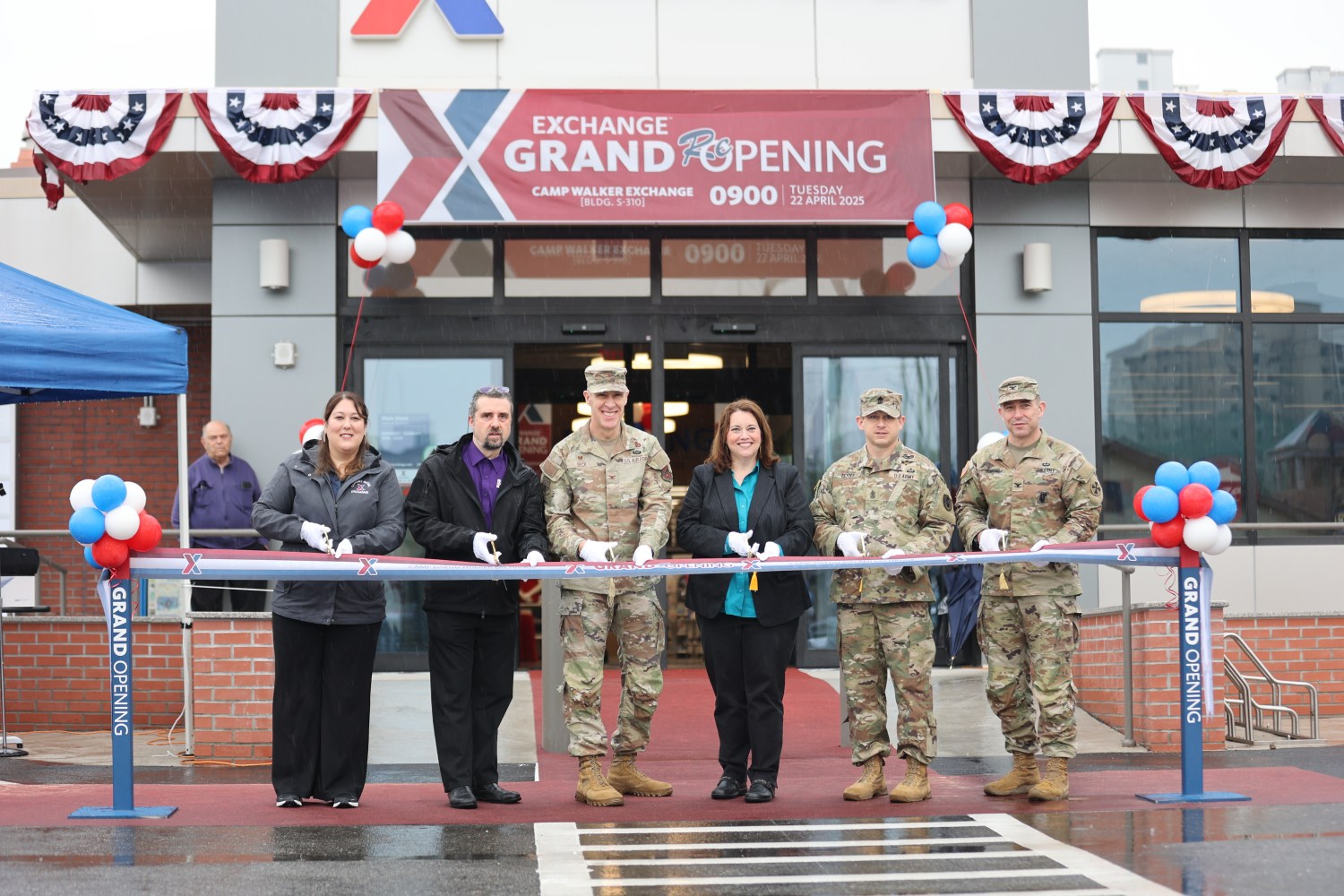 Celebrating the grand reopening of the Camp Walker main store are, from left: From left: Gina Janoushek, main store manager; Boris Nasci, general manager; Air Force Col. Jason Beck, Exchange Pacific Region commander; Jennifer Jordan, Exchange Pacific Region vice president; Army Sgt. Maj. Thomas Terry, Exchange Pacific Region senior enlisted advisor; Army Col. David Henning, garrison commander.