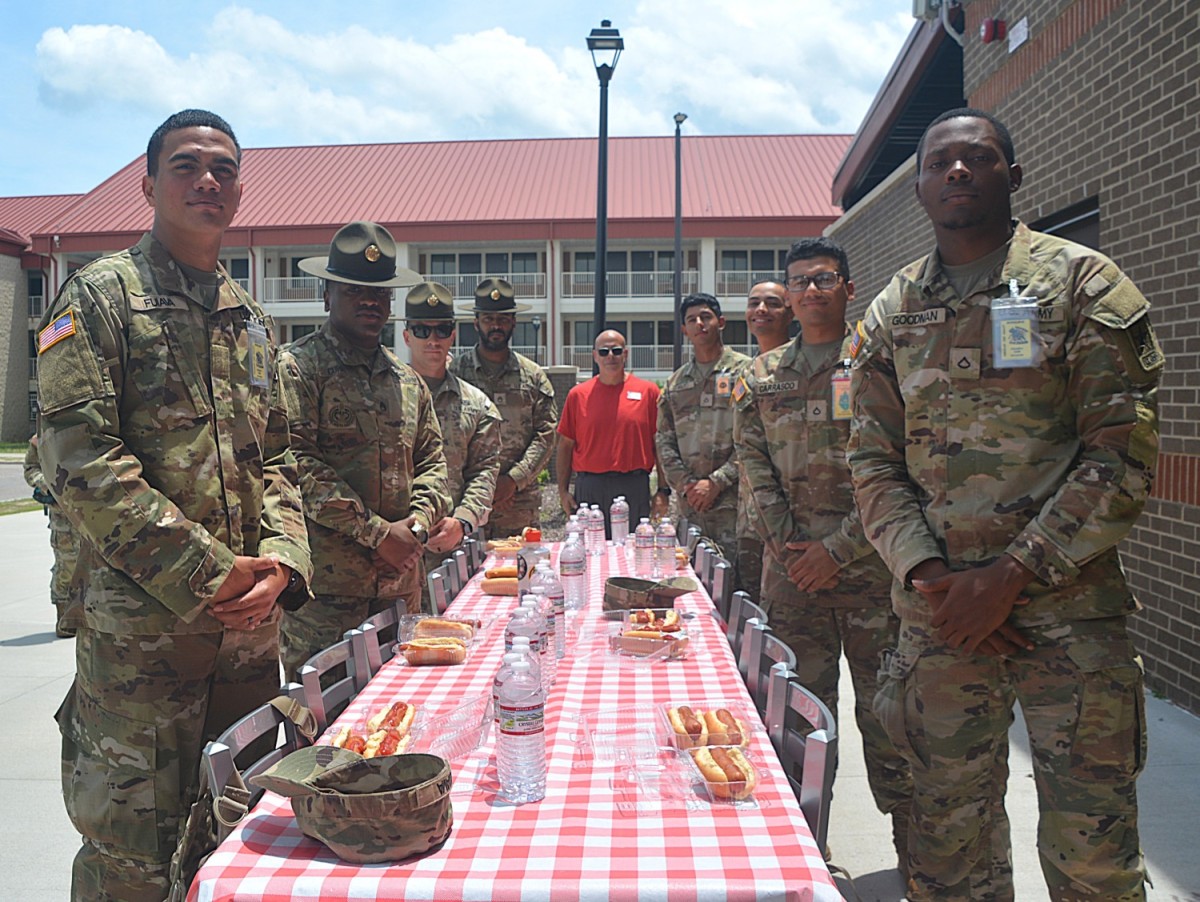 <b>Drill sergeants and AIT Soldiers prepare to compete in a hotdog eating contest hosted by the Fort Eisenhower Express “Troop Store” May 30. (Laura Levering, U.S. Army Signal School)</b>

