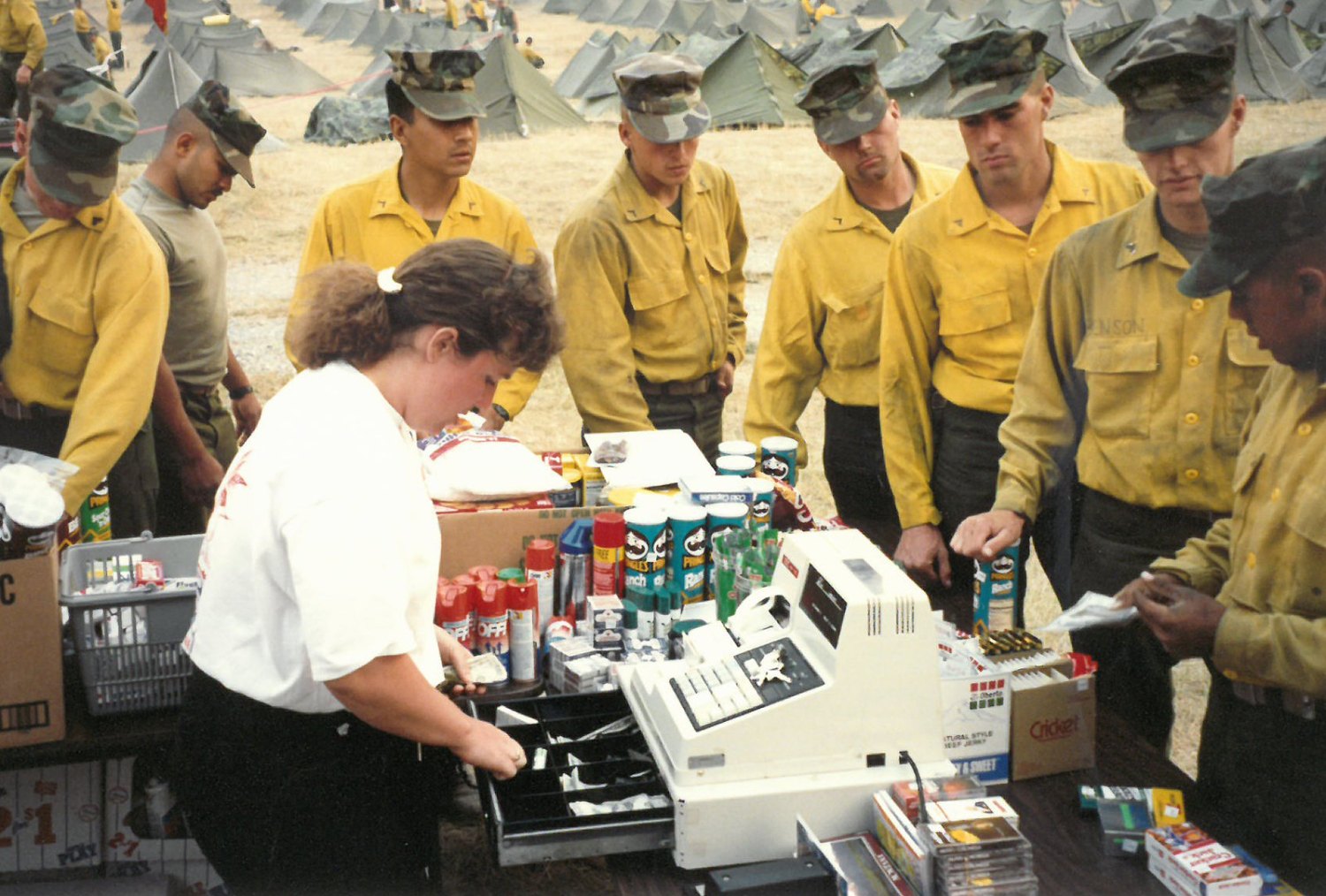 <b>“An associate serves troops get basic necessities from an AAFES mobile field exchange during forest fires in the Pacific Northwest, 1994. (Exchange History on Flickr)</b>