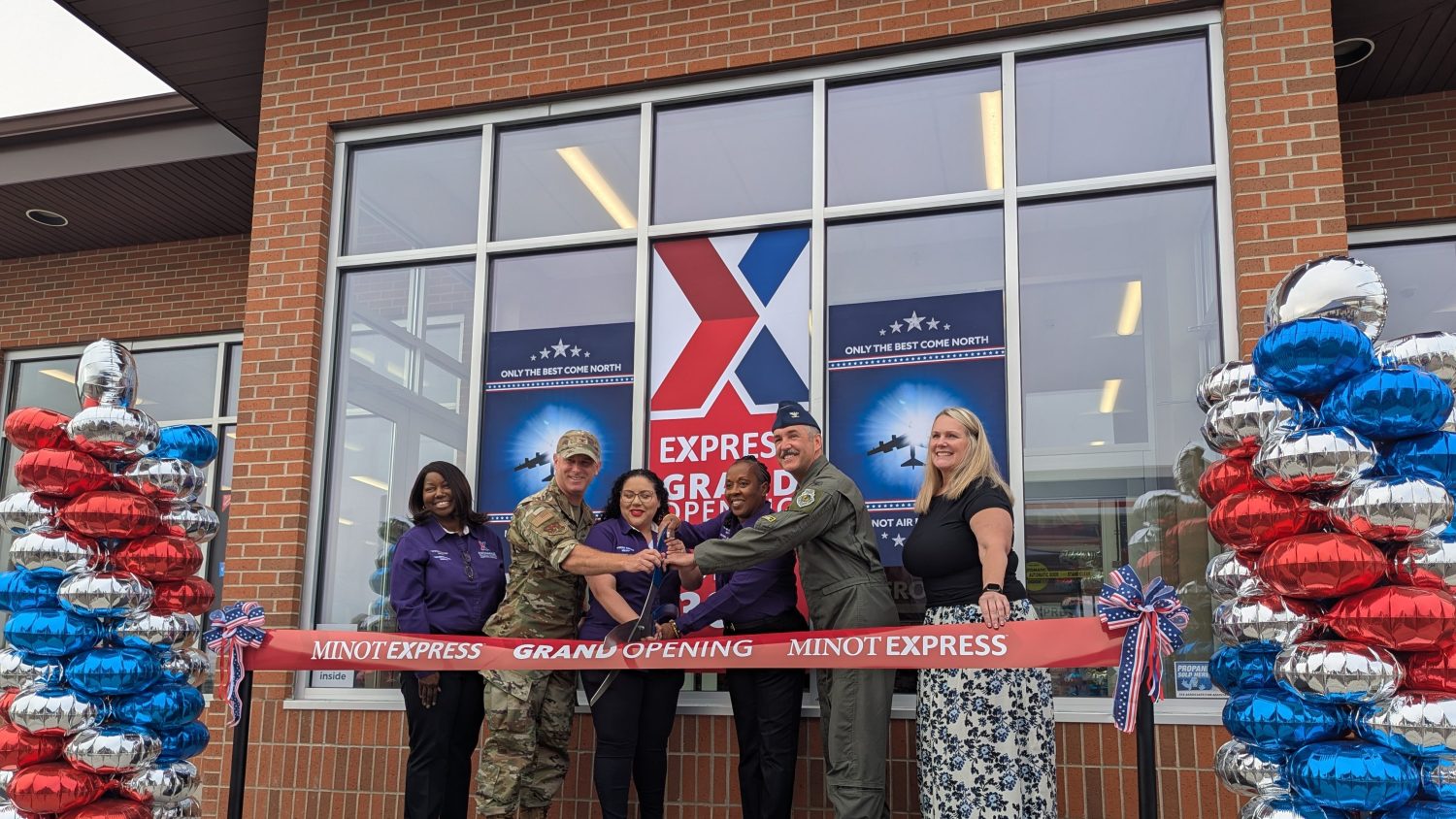 <b>Celebrating the grand opening of the renovated Express at Minot AFB are, from left: Regional Vice President Vanessa Rowland; 91st Missile Wing Commander Col. Jimmy L. Schlabach; Minot AFB Express Store Manager Elena Kilpatrick; Minot AFB Exchange General Manager Reatha Stockton; 5th Bomb Wing Commander Col. Jesse W. Lamarand; Exchange Central Region Senior Vice President Rebecca Santee.

