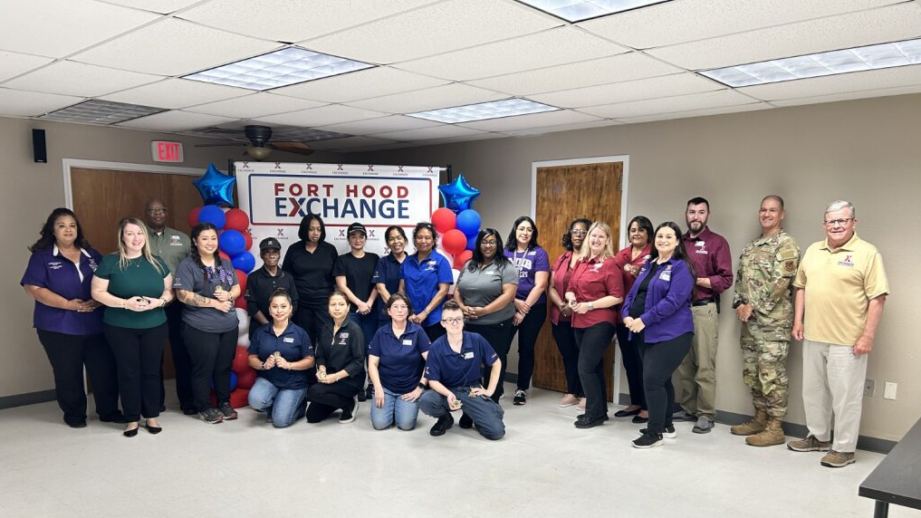 From left; West Fort Hood Express Store Manager, Dawn Beirne, Exchange Office Tech Stacey Meuiner, III Corps Express Shift Manager Lamar Griffin, Sales Area Manager Montida Tompkins, Food Service Worker Mary Austin, Food Service Worker Sausau "Shy" Garrett, Food Service Worker Marvi Edu, Customer Experience Associate Phorphan "Kai" Jimenez, III Corps Express Store Manager Eleanora Renguul, Sales Area Manager Leticia Hasty, Inventory Control Assistant Jennifer Rocha, Sales and Merchandise Manager Andrea Grant, Sales and Merchandise Manager April Hardin, Operations Manager Keila Figueroa, Retail Business Manager Paili Howard, Main Store Manager Dan Owens, CMSgt. Richard Martinez, Director/CEO Tom Shull. Front SPVY Customer Experience Assosiate Rosemarie Risinger, SPVY Customer Experience Assosiate Luz Fiumefreddo, Inventory Control Associate Diana Isenberg, Customer Experience Associate Yasmin "Kyle" Espinoza