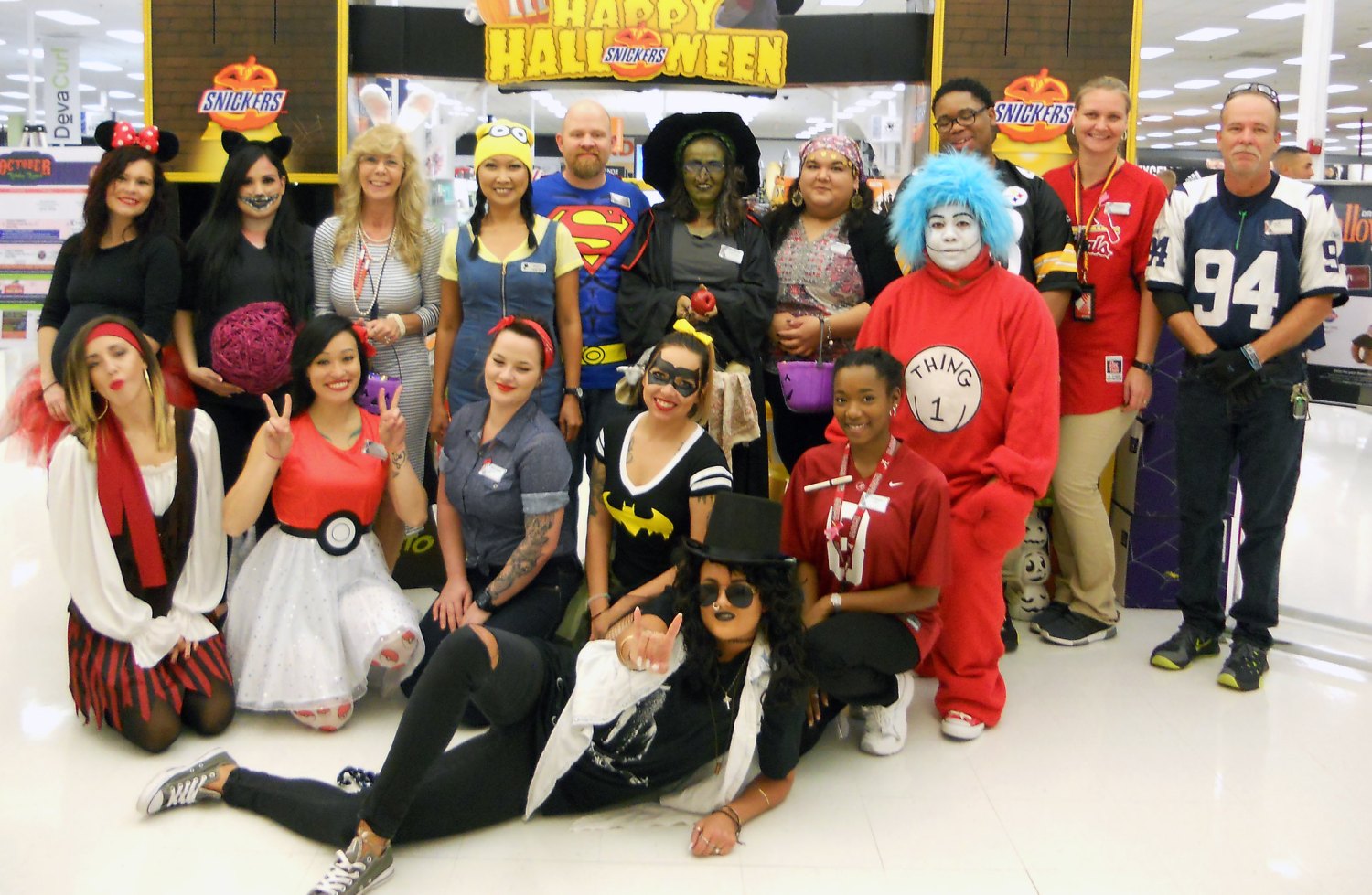2016 photo of group of 15 Fort Leonard Wood associates in Halloween costumes.