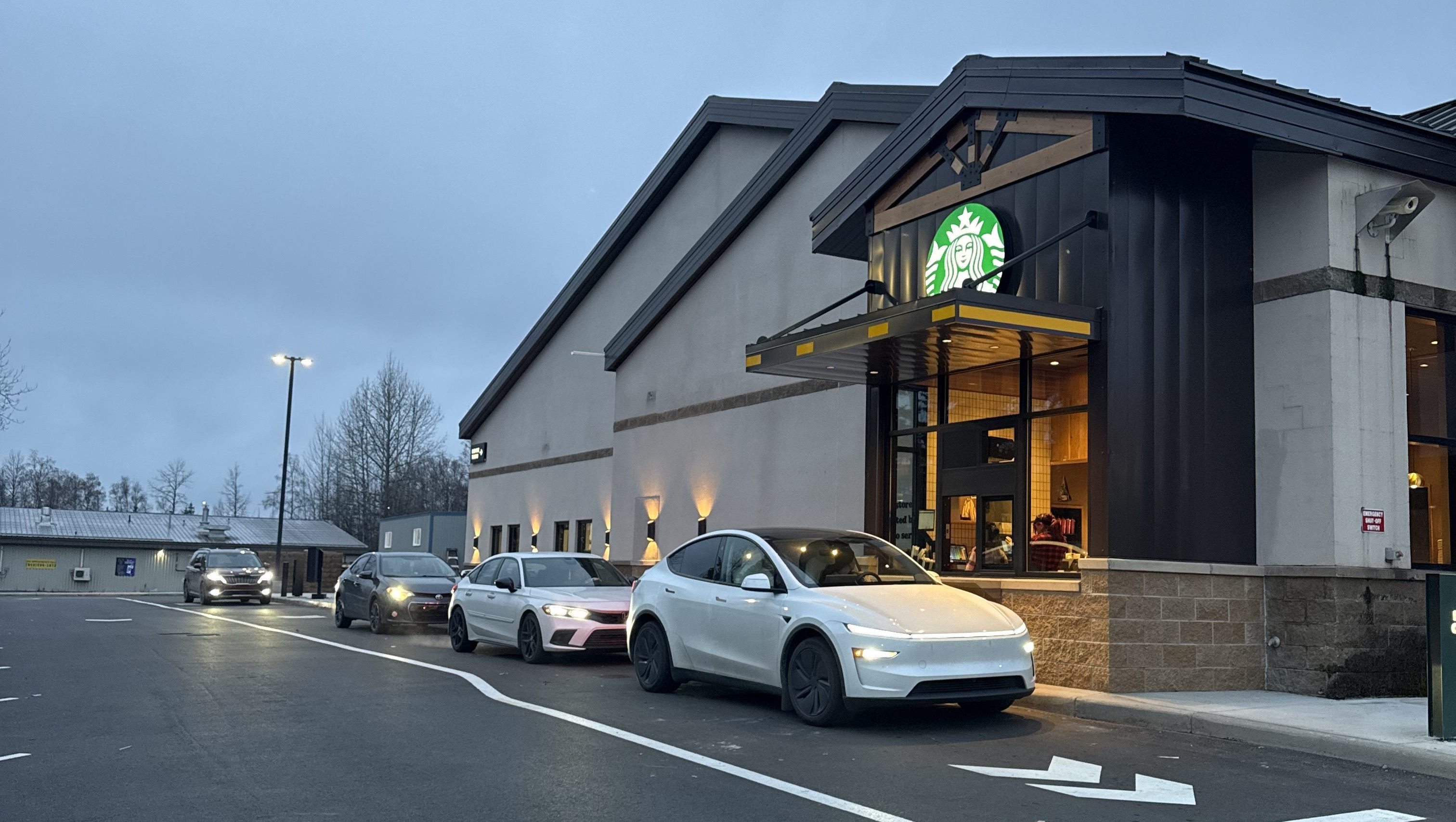 Starbucks drive-thru with cars.