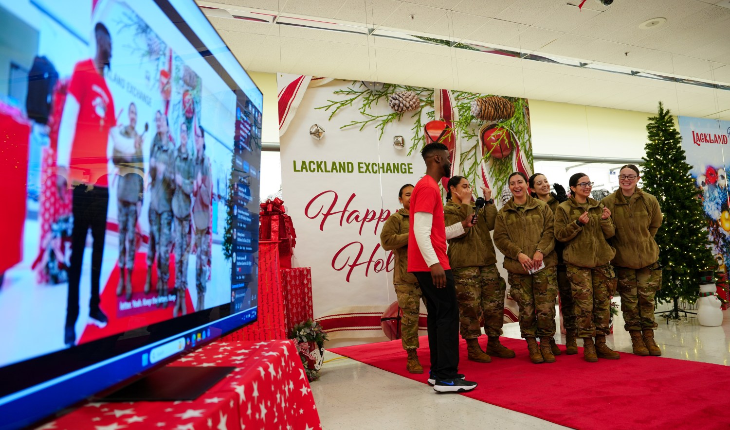 Six female trainees talk to a member of the Exchange social media team.