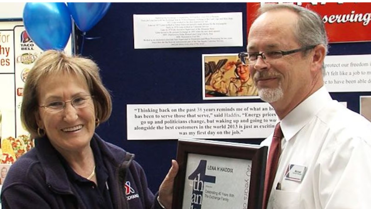 Lena Haddix with her 40-Year service award in 2014. Also pictured is then-Fort Sill PX General Manager Michael Brennan.
