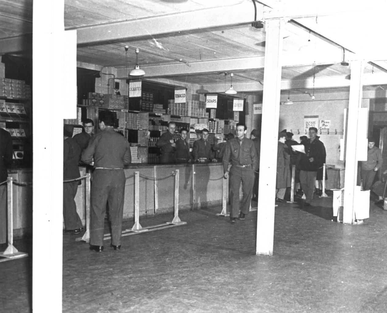 Servicemen lined up at couner.