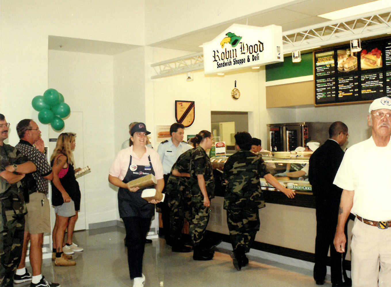 Customers at counter of Robjn Hood Sandwich Shoppe in 1997 at Edwards AFB