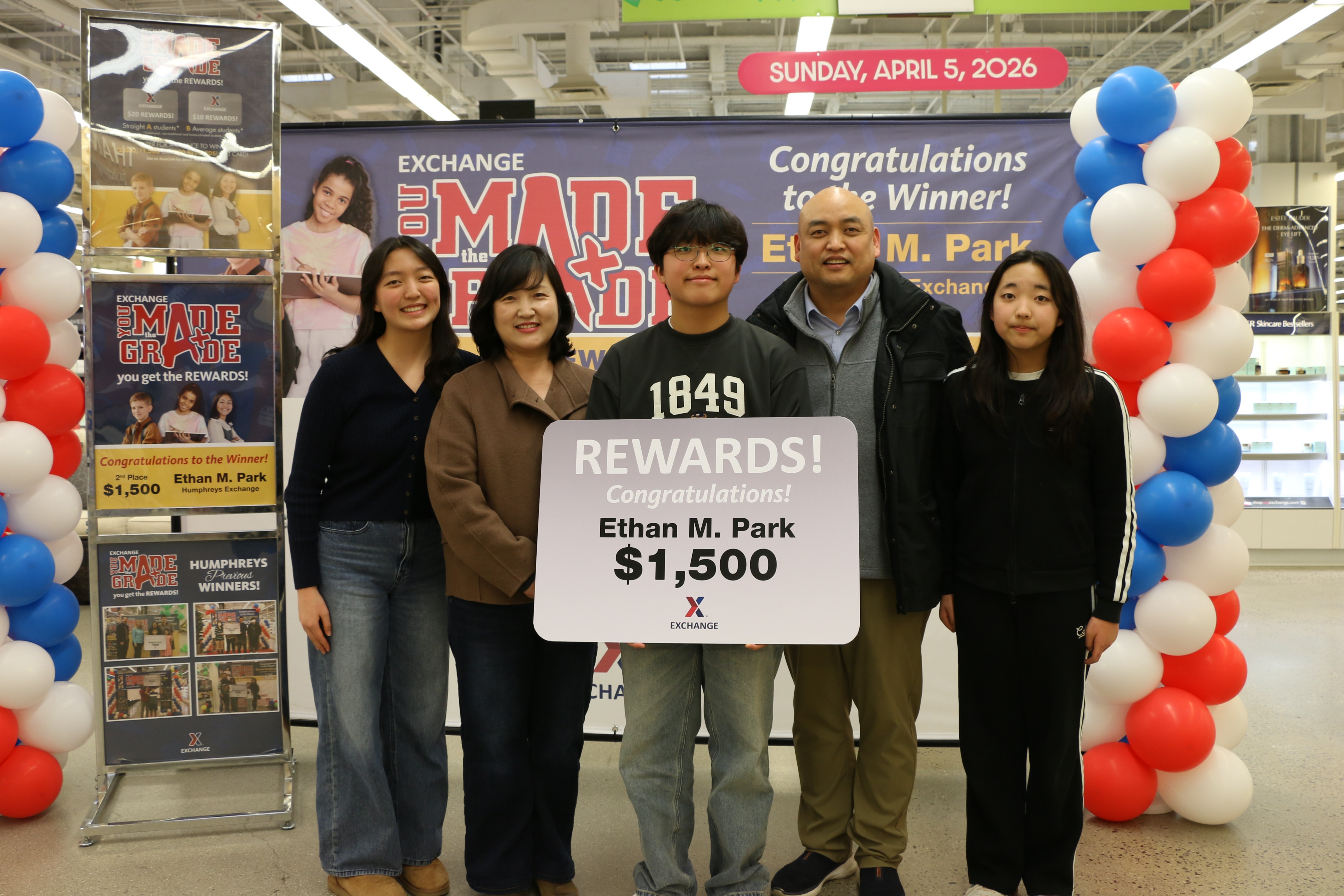 You Made the Grade second-place winner Ethan Park, with parents and two sisters.