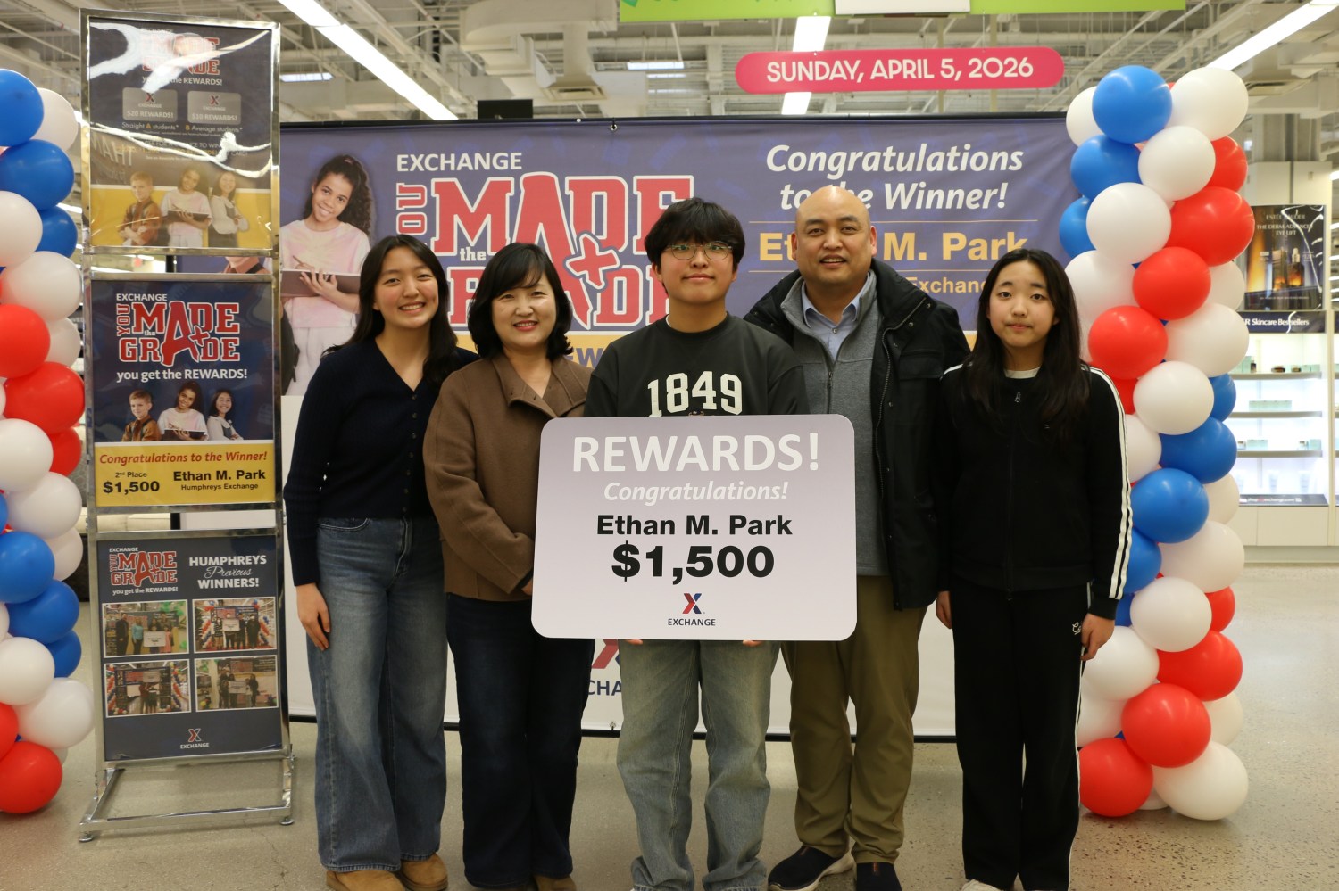 You Made the Grade second-place winner Ethan Park, with parents and two sisters.