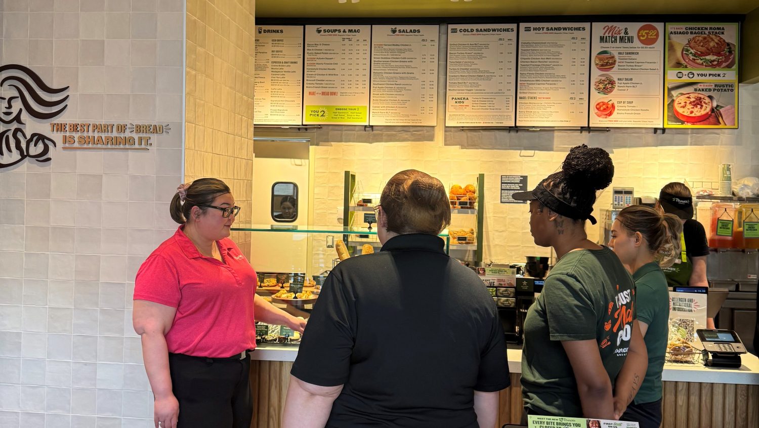 Trainer with trainees at JBLM Panera Bread.
