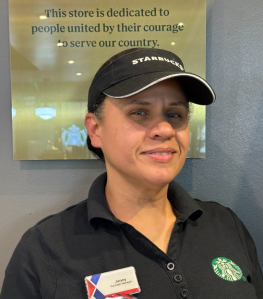 Jenny Vansise head shot. She is wearing a Starbucks cap and shirt.