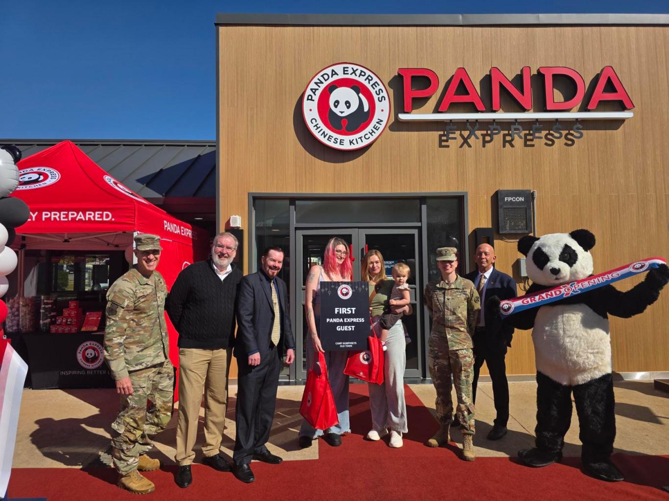 Group in front of Camp Humphreys Panda Express celebrating grand opening.