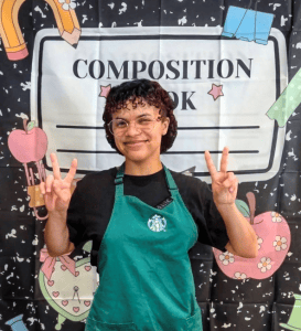Lanaia Schultz head shot. She is wearing a Starbucks apron.