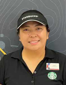 Neren Ruiz head shot. She is wearing a Starbucks shirt and cap.